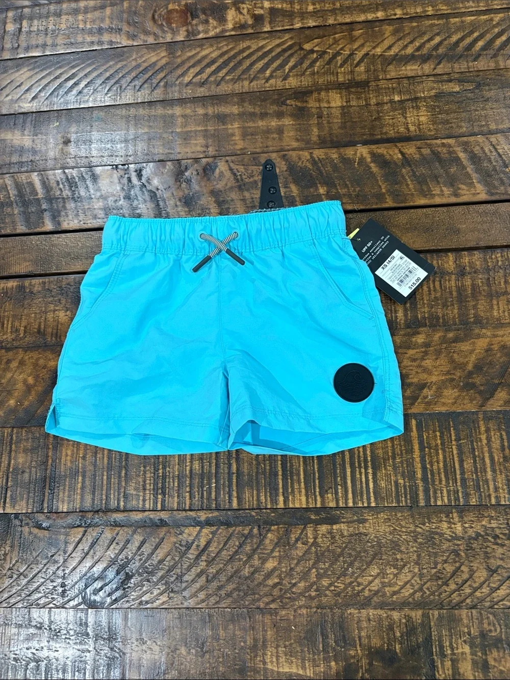 Swim Shorts with Waist Tie in blue turquoise color